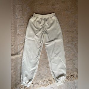 White faux leather joggers